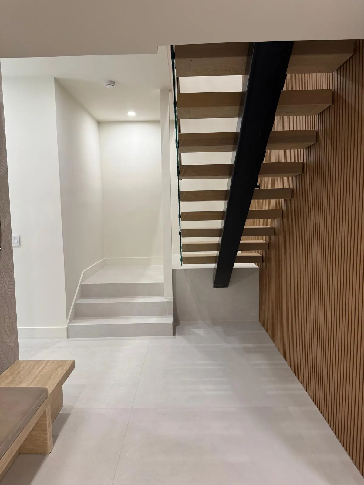 Porcelain Flooring — Large-format porcelain tile & wood-look planks.